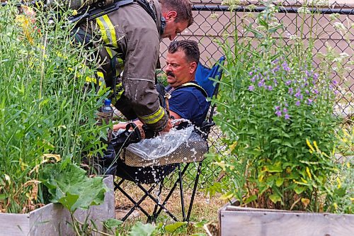 MIKE DEAL / FREE PRESS
WFPS crews work on putting out a fire at a house at 880 Alverstone Street Wednesday morning.
Reporter: Tyler Searle
260715 - Wednesday, July 15, 2026.