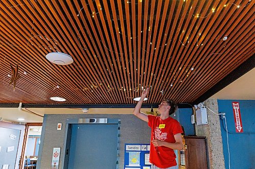MIKE DEAL / FREE PRESS
Summer student, Landen Goundry, turns on the fairy lights for the residents.
The Convalescent Home of Winnipeg at 276 Hugo Street North, is one of Canada's top-rated senior personal care homes.
Reporter: Janine LeGal
260714 - Tuesday, July 14, 2026.