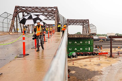 MIKE DEAL / FREE PRESS
Spane #15 of the Arlington Street Bridge is the first to be removed during the two year demolition project Thursday morning. By the end of the year most of the southern half of the bridge should be demolished.
Winnipeg Mayor Scott Gillingham was on hand to watch the start of the historic bridges removal.
Reporter: Malak Abas
260716 - Thursday, July 16, 2026.