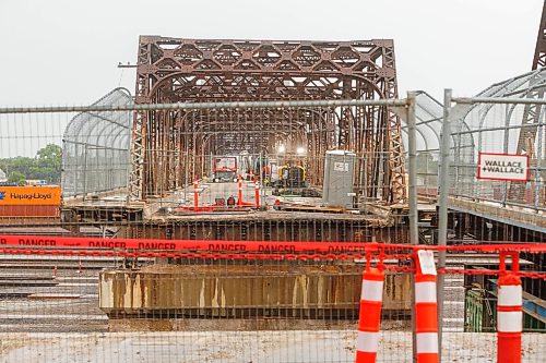 MIKE DEAL / FREE PRESS
Spane #15 of the Arlington Street Bridge is the first to be removed during the two year demolition project Thursday morning. By the end of the year most of the southern half of the bridge should be demolished.
Winnipeg Mayor Scott Gillingham was on hand to watch the start of the historic bridges removal.
Reporter: Malak Abas
260716 - Thursday, July 16, 2026.