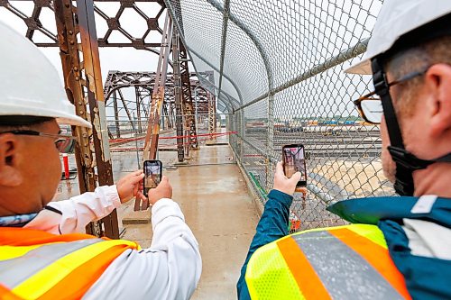 MIKE DEAL / FREE PRESS
Spane #15 of the Arlington Street Bridge is the first to be removed during the two year demolition project Thursday morning. By the end of the year most of the southern half of the bridge should be demolished.
Winnipeg Mayor Scott Gillingham was on hand to watch the start of the historic bridges removal.
Reporter: Malak Abas
260716 - Thursday, July 16, 2026.