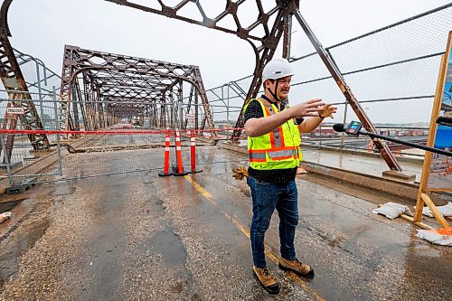 MIKE DEAL / FREE PRESS
Damir Muhurdarevic, the City’s Bridge Project Engineer tells the media how the spans are going to be removed.
Spane #15 of the Arlington Street Bridge is the first to be removed during the two year demolition project Thursday morning. By the end of the year most of the southern half of the bridge should be demolished.
Winnipeg Mayor Scott Gillingham was on hand to watch the start of the historic bridges removal.
Reporter: Malak Abas
260716 - Thursday, July 16, 2026.