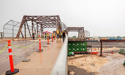 MIKE DEAL / FREE PRESS
Spane #15 of the Arlington Street Bridge is the first to be removed during the two year demolition project Thursday morning. By the end of the year most of the southern half of the bridge should be demolished.
Winnipeg Mayor Scott Gillingham was on hand to watch the start of the historic bridges removal.
Reporter: Malak Abas
260716 - Thursday, July 16, 2026.