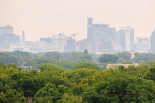 MIKE DEAL / FREE PRESS
The smoke filled skyline of downtown Winnipeg caused by forest fires in Northwestern Ontario. Poor air quality is forecast, so, people with health risks should limit their time outdoors.
260717 - Friday, July 17, 2026.