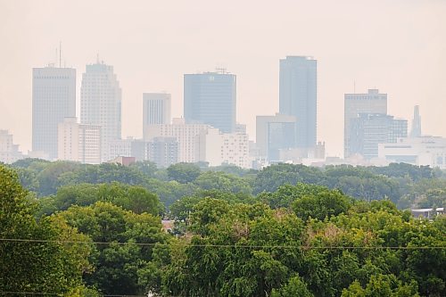MIKE DEAL / FREE PRESS
The smoke filled skyline of downtown Winnipeg caused by forest fires in Northwestern Ontario. Poor air quality is forecast, so, people with health risks should limit their time outdoors.
260717 - Friday, July 17, 2026.