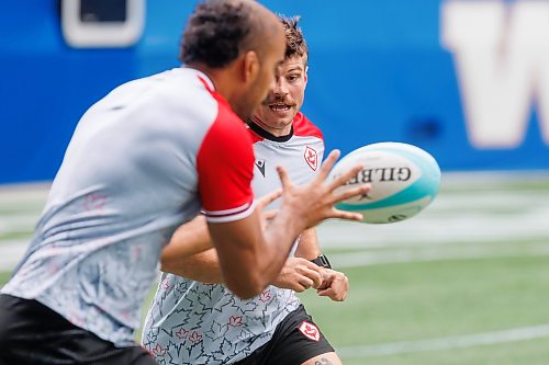 MIKE DEAL / FREE PRESS
Team captain, Andrew Quattrin (facing camera) is passed the ball by teammate Mason Flesch during the practice.
Members of Canada’s Men's Rugby Team take part in the Captain's Run Friday morning at Princess Auto Stadium ahead of their World Rugby Nations Cup match against Zimbabwe on July 18th.
Reporter: Josh Frey-Sam
260717 - Friday, July 17, 2026.
