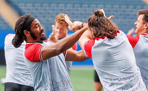 MIKE DEAL / FREE PRESS
Izzak Kelly (left) and two of his team mates run a drill to keep from getting slapped in the face during practice.
Members of Canada’s Men's Rugby Team take part in the Captain's Run Friday morning at Princess Auto Stadium ahead of their World Rugby Nations Cup match against Zimbabwe on July 18th.
Reporter: Josh Frey-Sam
260717 - Friday, July 17, 2026.