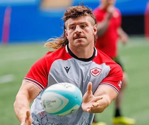 MIKE DEAL / FREE PRESS
Team captain, Andrew Quattrin, tosses the ball during practice.
Members of Canada’s Men's Rugby Team take part in the Captain's Run Friday morning at Princess Auto Stadium ahead of their World Rugby Nations Cup match against Zimbabwe on July 18th.
Reporter: Josh Frey-Sam
260717 - Friday, July 17, 2026.