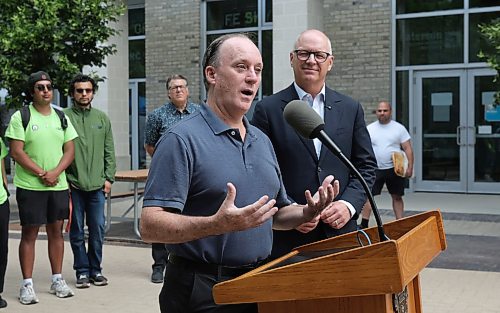 Ruth Bonneville / Free Press
Local Mayor Announces Performing Arts Wayfinder Program
Chris Fensom, Co-Chair of WSO Members, answered questions from the media with the mayor at Wayfinder presser Monday.
Winnipeg Mayor Scott Gillingham announces the launch of the Performing Arts Wayfinder Program, a new initiative that will provide dedicated courtesy walks and enhanced safety patrols around Downtown performing arts venues throughout the 2026-27 season in Market Square Monday.
Also in attendance at the presser: City Councillor Vivian Santos
Mitch Bourbonniere, Community Outreach Liaison, Downtown Community Safety Partnership (DCSP)
Chris Fensom, Co-Chair of WSO Members’ Committee and Principal Trumpet of the WSO
See story by. Malak
July 20th, 2026