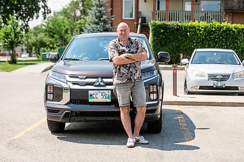 MIKAELA MACKENZIE / FREE PRESS
	
Harvey Tschetter, whose catalytic converter got stolen two days after he purchased his vehicle, with the repaired automobile on Monday, July 20, 2026. 

For front &amp; centre story.
Free Press 2026
