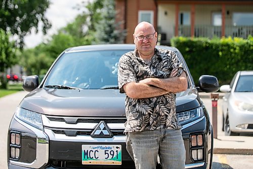MIKAELA MACKENZIE / FREE PRESS
	
Harvey Tschetter, whose catalytic converter got stolen two days after he purchased his vehicle, with the repaired automobile on Monday, July 20, 2026. 

For front &amp; centre story.
Free Press 2026