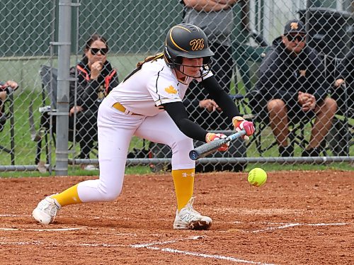 Westman Magic batter Brooke Collins lays down a bunt against Central Energy in under-13 Premier Manitoba Softball League action at Ashley Neufeld Softball Complex on June 27. (Perry Bergson/The Brandon Sun)
