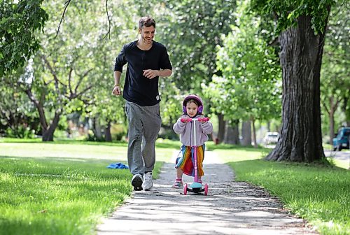 Ruth Bonneville / Free Press

Standup -  Lil’ Scooter

Three-year-old Isla Drozdowski enjoys her afternoon hanging out with dad Jereme Drozdowski scooting along the sidewalk on Lockwood just prior to the duo heading out to the pool Tuesday. 

July 21st,  2026