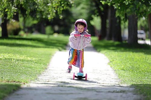 Ruth Bonneville / Free Press

Standup -  Lil’ Scooter

Three-year-old Isla Drozdowski enjoys her afternoon hanging out with dad scooting along the sidewalk on Lockwood just prior to the duo heading out to the pool Tuesday. 

July 21st,  2026