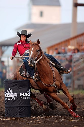 Ferrah Fogg rounds a barrel atop her horse during the ladies barrel racing event during last year's event. (Tim Smith/The Brandon Sun files)