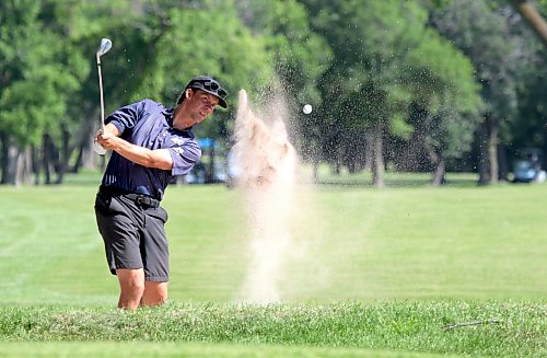 Brandon's Evan Nachtigall hits a bunker shot during the second round of the Golf Manitoba men's amateur at St. Boniface Golf Club on Tuesday. (Thomas Friesen/The Brandon Sun)