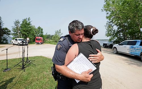 Ruth Bonneville / Free Press

Local RCMP update Nutimik search 

RCMP Staff Sgt. Cory Myers gives Allison Baker-Thiessen, Nutimik Lodge owner a supportive hug just prior to her speaking with he media at a news presser at the boat launch at Nutimik Lake Thursday. 

Story: RCMP confirmed at presser at the boat launch at Nutimik Lake  that the body of the missing 10-year-old boy has been recovered following days of an intensive search near the falls at  Nutimik Lake.  Search and rescue teams including the RCMP, charitable organizations, local businesses and the members of the public continue to search for his 13-year-old brother.  

Two boys, aged 10 and 13, slipped into the fast-moving rapids near Sturgeon Falls Trail in Manitoba's Nutimik Lake last Saturday, July 18th while with family,  

See story by Moe

July 23rd,  2026