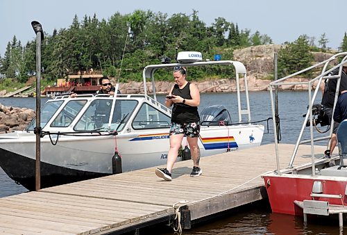 Ruth Bonneville / Free Press

Local RCMP update Nutimik search 

Allison Baker-Thiessen, Nutimik Lodge owner, stands on the dock with the RCMP and others involved in the  search and rescue efforts at Camp Nutimik Thursday. Allison Baker-Thiessen and her husband have been fully involved from the beginning in assisting with the rescue. 

Story: RCMP confirmed at presser at the boat launch at Nutimik Lake  that the body of the missing 10-year-old boy has been recovered following days of an intensive search near the falls at  Nutimik Lake.  Search and rescue teams including the RCMP, charitable organizations, local businesses and the members of the public continue to search for his 13-year-old brother.  Two boys, aged 10 and 13, slipped into the fast-moving rapids near Sturgeon Falls Trail in Manitoba's Nutimik Lake last Saturday, July 18th while with family,  

See story by Moe

July 23rd,  2026