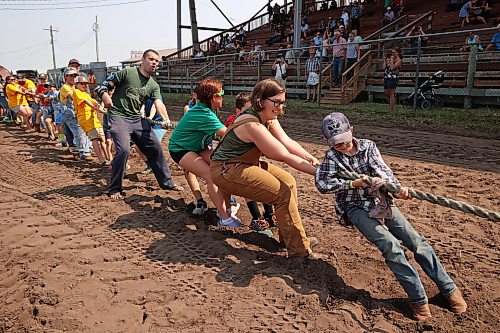 23072026
Volunteers test their collective strength in a tug-o-war against an antique tractor at the opening day of the 2026 Manitoba Thresherman’s Reunion and Stampede on Thursday afternoon.
(Tim Smith/The Brandon Sun)