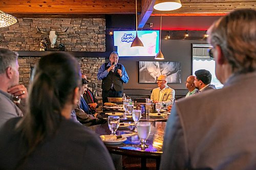 BROOK JONES/FREE PRESS
Members of the Indigenous Taxi Safety Committee and representatives from Duffy's Taxi and Unicity Taxi attend a breaking bread dinner with Winnipeg mayor Scott Gillingham at the Pony Corral on Nairn Avenue in Winnipeg, Man., Thursday, July 23, 2026. The event was held as a way to celebrate reconciliation and the taxi safety partnerships. Pictured: Eric Robinson (left) who is chairman of the taxi safety committee and Winnipeg Mayor Scott Gillingham (right).