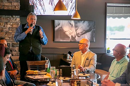 BROOK JONES/FREE PRESS
Members of the Indigenous Taxi Safety Committee and representatives from Duffy's Taxi and Unicity Taxi attend a breaking bread dinner with Winnipeg mayor Scott Gillingham at the Pony Corral on Nairn Avenue in Winnipeg, Man., Thursday, July 23, 2026. The event was held as a way to celebrate reconciliation and the taxi safety partnerships. Pictured: Eric Robinson (left) who is chairman of the taxi safety committee and Winnipeg Mayor Scott Gillingham (right).