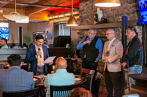BROOK JONES/FREE PRESS
Members of the Indigenous Taxi Safety Committee and representatives from Duffy's Taxi and Unicity Taxi attend a breaking bread dinner with Winnipeg mayor Scott Gillingham at the Pony Corral on Nairn Avenue in Winnipeg, Man., Thursday, July 23, 2026. The event was held as a way to celebrate reconciliation and the taxi safety partnerships. Pictured: Duffy’s Taxi Manager Ram Valluru speaks while Eric Robinson who is chairman of the taxi safety committee, Winnipeg Mayor Scott Gillingham, and Elder Carol Stone look on.