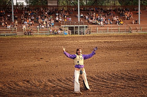 Corbin Boczkowski of Lethbridge, Alta., cheers after competing in the novice bareback event at the opening go-round of the 2026 Manitoba Thresherman’s Reunion and Stampede rodeo on Thursday evening. (Tim Smith/The Brandon Sun)
