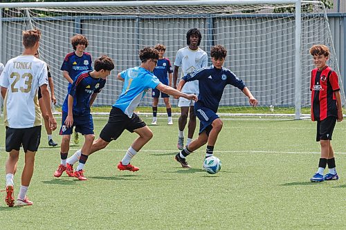 MIKE DEAL / FREE PRESS
Some of the athletes play a bit of scrimmage after the announcement.
Surrounded by young soccer athletes, Sports, Culture, Heritage and Tourism Minister Nellie Kennedy announces that the provincial government will be investing $750,000 to support upgrades to the Ralph Cantafio Soccer Complex (900 Waverley Street).
Héctor Vergara, executive director, Manitoba Soccer Association, and Raff Cantafio, Cantafio family also spoke, both getting emotional during their speeches.
Reporter: Grace Penner
260724 - Friday, July 24, 2026.