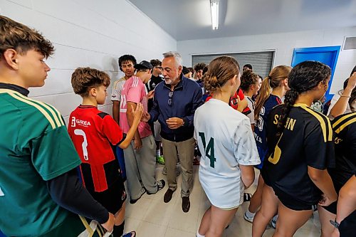 MIKE DEAL / FREE PRESS
Raff Cantafio interacts with young athletes after the announcement.
Surrounded by young soccer athletes, Sports, Culture, Heritage and Tourism Minister Nellie Kennedy announces that the provincial government will be investing $750,000 to support upgrades to the Ralph Cantafio Soccer Complex (900 Waverley Street).
Héctor Vergara, executive director, Manitoba Soccer Association, and Raff Cantafio, Cantafio family also spoke, both getting emotional during their speeches.
Reporter: Grace Penner
260724 - Friday, July 24, 2026.