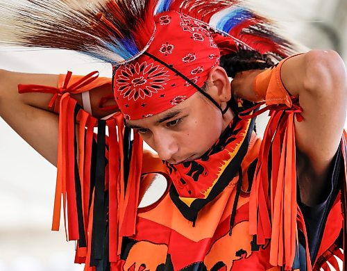 JOHN WOODS / FREE PRESS
Jayden Bear prepares to participate in the grand entrance of the powwow at Anishinaabe Days Sunday, July 26, 2026.
reporter: standup
