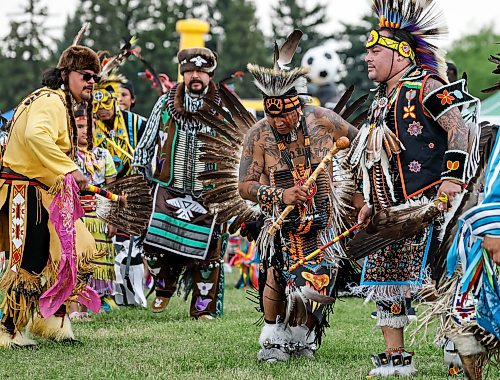 JOHN WOODS / FREE PRESS
People participate in the grand entrance of the powwow at Anishinaabe Days Sunday, July 26, 2026.
reporter: standup