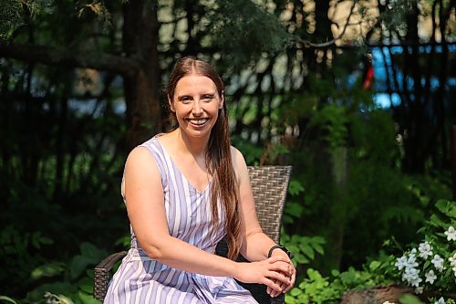 Brandon University co-operative education program co-ordinator Cora Dupuis sits in the historic Moreland Manor garden on Sunday afternoon. Dupuis, who has led the program for seven years, seeks to become the Manitoba NDP candidate for Brandon West. (Abiola Odutola/The Brandon Sun)