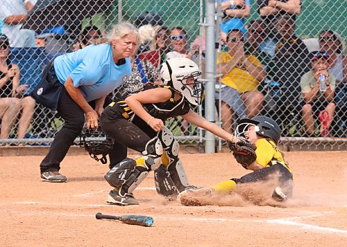 Westman Fury catcher Scotland Malcolm puts a tag on Westman Storm base runner Daphne Holleman (3) a moment too late as she slides safely into the plate under the watchful eye of umpire Brenda Stagg during Softball Manitoba's under-11 provincial championship at Ashley Neufeld Softball Complex on Sunday afternoon. (Perry Bergson/The Brandon Sun)
July 26, 2026