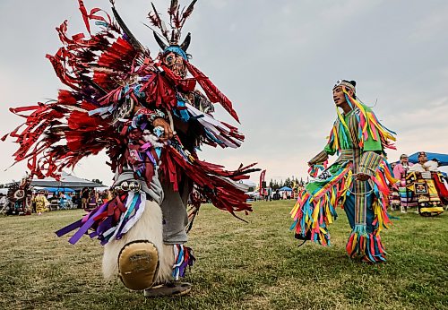 JOHN WOODS / FREE PRESS
People participate in the grand entrance of the powwow at Anishinaabe Days Sunday, July 26, 2026.
reporter: standup