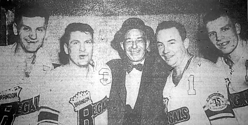 Brandon Regals player-coach Don (Bones) Raleigh, Vic Lynn, owner Jim Piggott, goalie Lucien Dechene and rookie Bill Voss pose for a picture that ran in the April 12, 1957 edition of The Brandon Sun after they beat the Edmonton Flyers 3-0 to win the best-of-seven Prairie Division championship in five games. Voss had two goals and an assist that night. (Brandon Sun files)