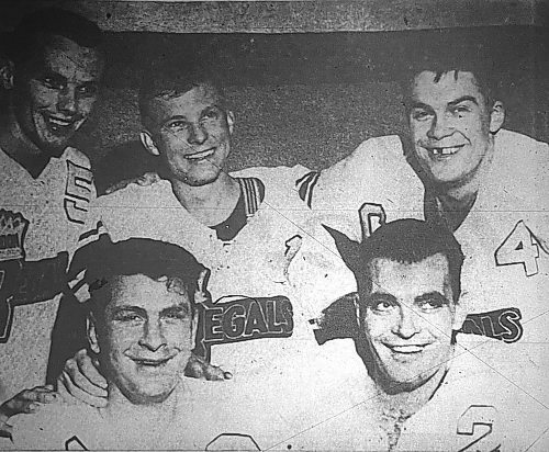 Callup goalie Don (Chuck) Woodland (1), in the middle of the back row, is flanked by Howie Yanosik (5), Bob Chrystal (4), Vic Lynn, bottom left and Howie Milford (2) after a 4-1 win over the Calgary Stampeders on Nov. 7, 1956. (Brandon Sun files)