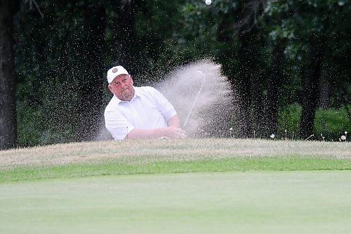 Jay Doyle hits a bunker shot during the second round of the Golf Manitoba men's amateur at St. Boniface Golf Club on Tuesday. (Thomas Friesen/The Brandon Sun)