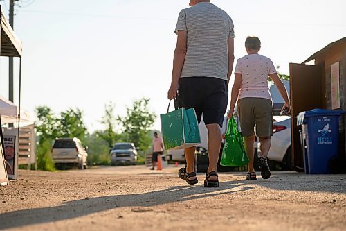 Mike Sudoma / Free Press
Eager shoppers start to shop a little earlier than the official 8am opening time at the St Norbert Farmers Market early Saturday morning
July 25, 2026