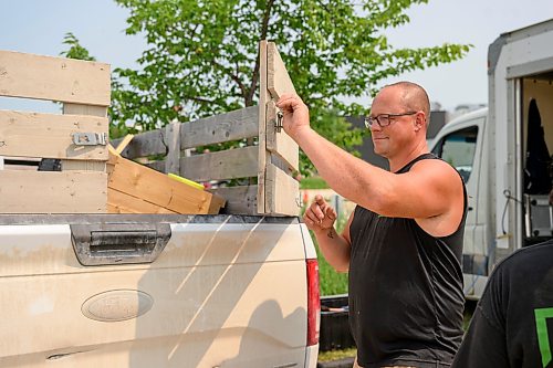 Mike Sudoma / Free Press
By 2:30pm Brian Penner of FTF Farms finishes packing up his booth after a long hot Saturday afternoon at the St Norbert Farmers Market Saturday afternoon
July 25, 2026