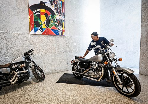 JOHN WOODS / FREE PRESS
Steve Xoumpholphakdy sets up his bike for a Motorcycle pop-up and MotoSocial at the Winnipeg Art Gallery Tuesday, July 28, 2026.
reporter: tiago