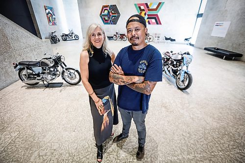 JOHN WOODS / FREE PRESS
Rachel Baerg, head of Education and Programs at Winnipeg Art Gallery (WAG), and Steve Xoumpholphakdy setup for a Motorcycle pop-up and MotoSocial at the WAG Tuesday, July 28, 2026. 

reporter: tiago