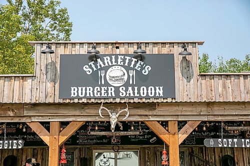BROOK JONES/FREE PRESS
The Starlette's Burger Saloon at 60122 Juno Rd., just north of Elma, Man., is pictured on Saturday, July 25, 2026. Star Giesbrecht and her husband Lee Giesbrecht opened the Starlette's Burger Saloon in May 2025 after Lee made the dining patio to like an old-fashioned, western saloon from recovered barn wood.