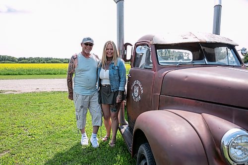BROOK JONES/FREE PRESS
Star Giesbrecht and her husband Lee Giesbrecht opened the Starlette's Burger Saloon at 60122 Juno Rd., just north of Elma, Man., in May 2025 after Lee made the dining patio to like an old-fashioned western saloon from recovered barn wood. Lee (left) and Star stand next to a 1947 Studebaker truck which is a feature on the grounds of Starlette's Burger Saloon. Lee and Star were pictured on Saturday, July 25, 2026.