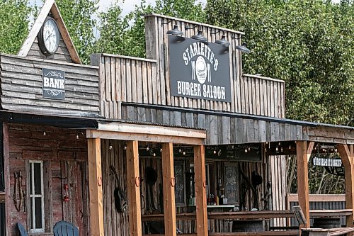 OOK JONES/FREE PRESS
The Starlette's Burger Saloon at 60122 Juno Rd., just north of Elma, Man., is pictured on Saturday, July 25, 2026. Star Giesbrecht and her husband Lee Giesbrecht opened the Starlette's Burger Saloon in May 2025 after Lee made the dining patio to look like an old-fashioned western saloon from recovered barn wood.