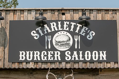 OOK JONES/FREE PRESS
The Starlette's Burger Saloon at 60122 Juno Rd., just north of Elma, Man., is pictured on Saturday, July 25, 2026. Star Giesbrecht and her husband Lee Giesbrecht opened the Starlette's Burger Saloon in May 2025 after Lee made the dining patio to look like an old-fashioned western saloon from recovered barn wood.