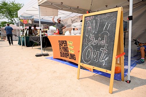 Mike Sudoma / Free Press
A sign reading Sold Out at Super Flying Dumplings stand notifying the shoppers that they are fully sold-out around 1:30pm Saturday afternoon
July 25, 2026