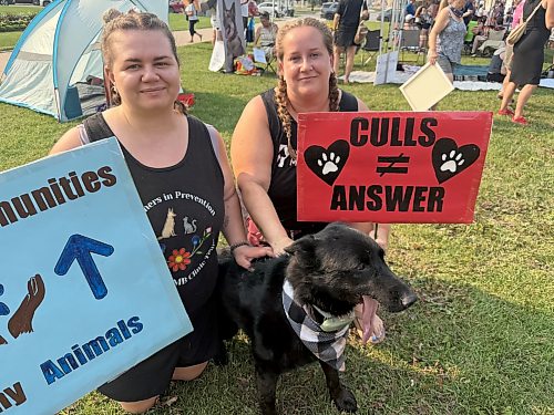 Jennelle Andre-Sealey, left, and Tatiana Janovcik, with husky mix and rez dog Bear, whose jaw was injured by a gunshot while on God’s Lake Narrows First Nation. The two women worked closely with Amanda Nobiss through their group Partners in Prevention, a branch of K9 Advocacy Manitoba, and both said more resources and government action is critical to protecting both dog populations and communities as a whole. (Morgan Modjeski / Free Press)