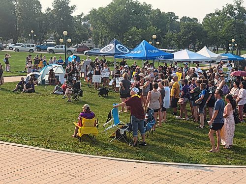 About 200 people gathered at the Manitoba legislature Wednesday evening for a “No More Manitoba Maulings” rally. (Morgan Modjeski / Free Press)