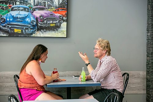 BROOK JONES/FREE PRESS
Free Press Religion reporter Josiah Neufeld (right) interviews Lisa Bowden who is involved in prison justice work. Neufeld and Bowden were pictured at Soups, Sandwiches & More in Winnipeg, Man., Wednesday, July 29, 2026.