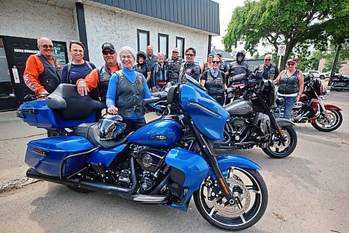 Fifteen riders from the Bordertown Chapter of the Harley Owners Group (HOG) based out of Lethbridge, Alta., take a moment for a group shot on Princess Avenue on Thursday afternoon. The riders had stopped at The Dock on Princess for lunch while on their way to Winnipeg for the start of the 16th Annual Prairie Regional HOG Rally, hosted by Harley-Davidson Winnipeg and the Winnipeg HOG Chapter this weekend. (Matt Goerzen/The Brandon Sun)